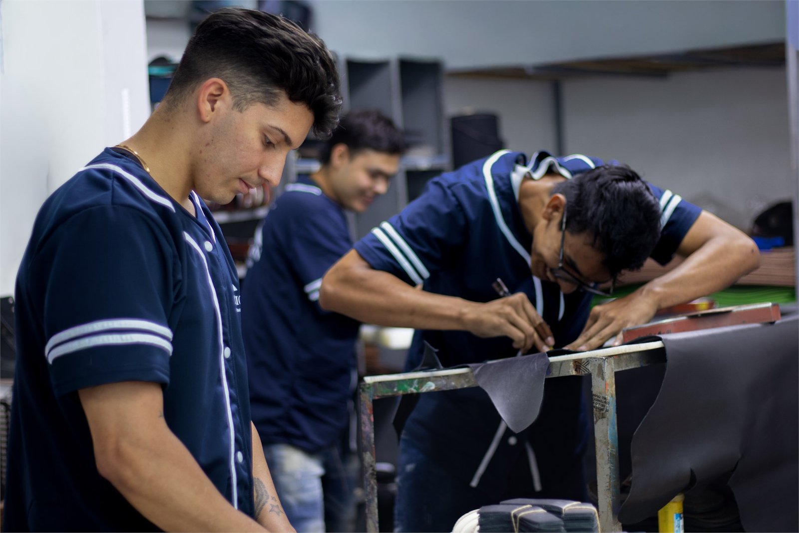 SR Faxhion craftspeople shaping footwear components in the Bogotá workshop